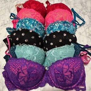 Six PINK Victoria’s Secret “Date Push Up” bras sizes 32A & 34A